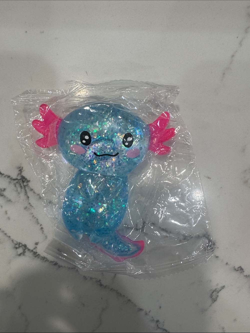 Sparkly Blue Axolotl Figure with Pink Gills squishy viral